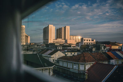 High angle view of buildings against sky