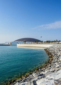 Scenic view of sea against blue sky