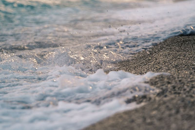 Close-up of wave on beach