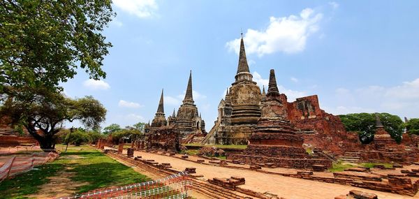 Panoramic view of temple building against sky