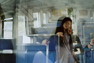 Multiple image of woman in bus