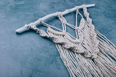 High angle view of rope tied on boat