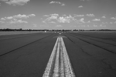 View of airport runway against sky