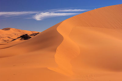 Scenic view of desert against sky