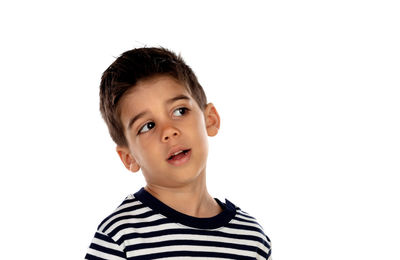 Portrait of boy against white background