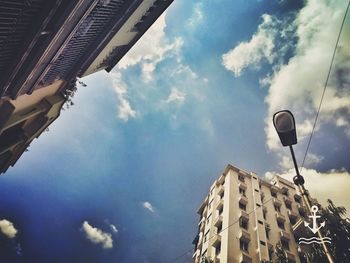 Low angle view of skyscrapers against sky