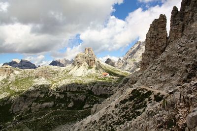 Panoramic view of rocky mountains against sky