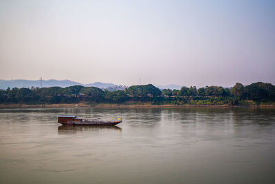 Scenic view of lake against clear sky