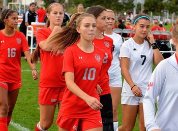 Group of people on soccer field