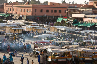 High angle view of people at market in city