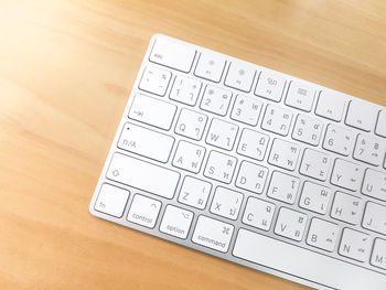 High angle view of computer keyboard on table