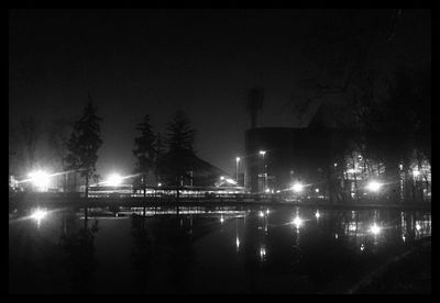 Reflection of illuminated buildings in water