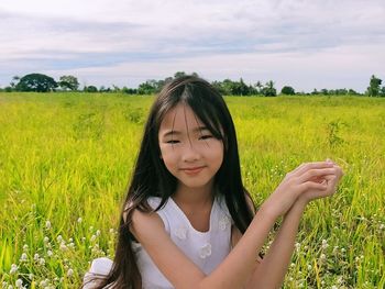 Young woman in field