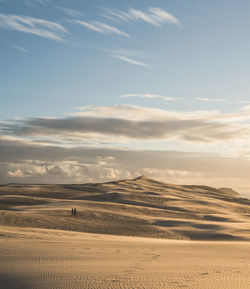 Scenic view of desert against sky