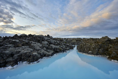 Amazing landscape of geothermal spring with volcanic coast on island