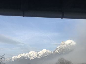 Snowcapped mountains against sky