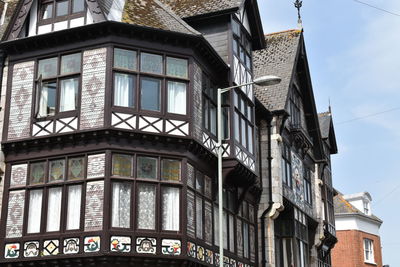 Low angle view of old building in city