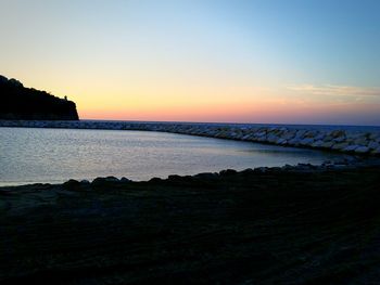 Scenic view of sea at sunset