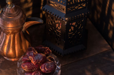 High angle view of old lantern on table