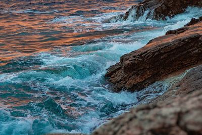 Scenic view of rocks in sea