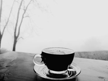 Close-up of coffee cup on table