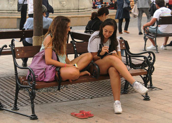 People sitting on bench