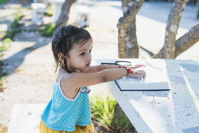 Young woman using mobile phone