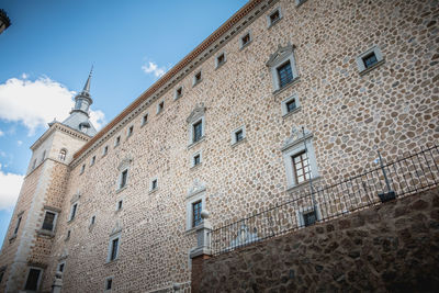 Low angle view of old building against sky