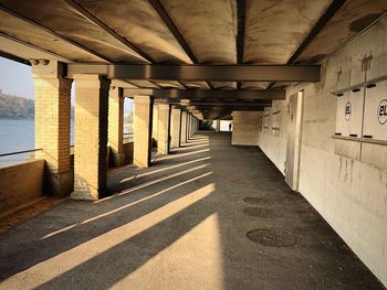 Sunset long shadows in concrete underpass