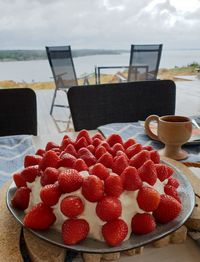 Strawberries in plate on table