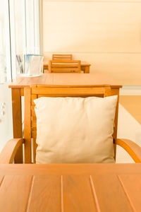 Empty chair on table at home