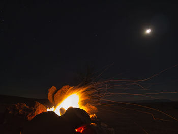 Bonfire against sky at night