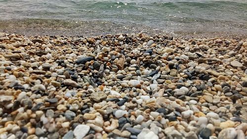 Close-up of pebbles on beach