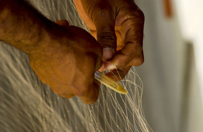 Close-up of man preparing food