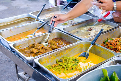 High angle view of man preparing food