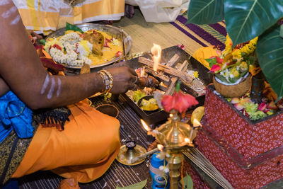 Close-up of hand holding wine in temple