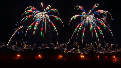 Firework display at night