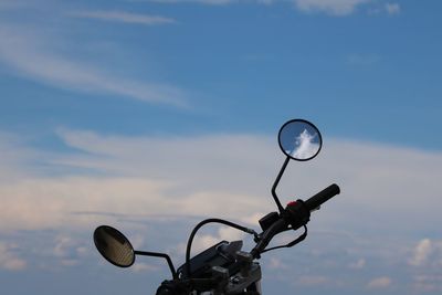 Low angle view of bicycle against sky