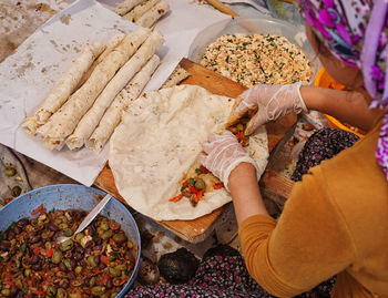 High angle view of woman preparing food