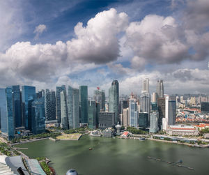 Modern buildings in city against sky