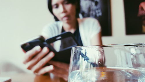 Close-up of hand holding drink