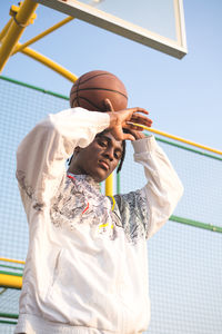 Portrait of the black man with the basketball