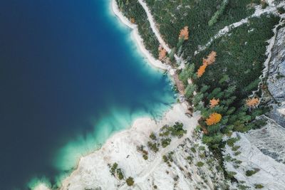 High angle view of rocks by lake