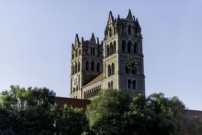 Low angle view of st. maximilian church against clear sky