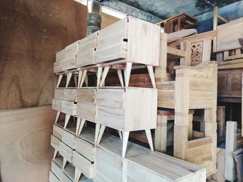 Stack of wooden chairs at home