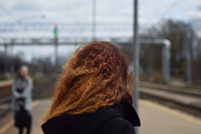 Close-up of woman with redhead