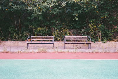 Empty benches in park