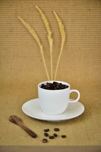 Close-up of coffee cup on table