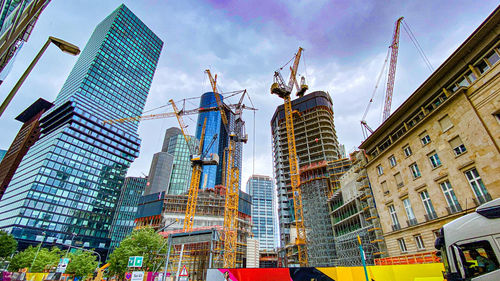 Low angle view of skyscrapers against sky