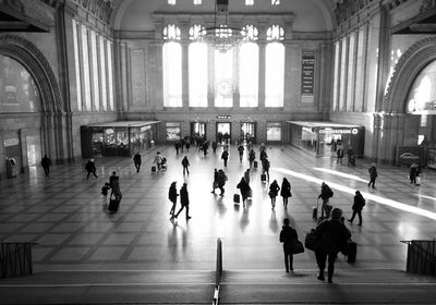 People walking in railroad station